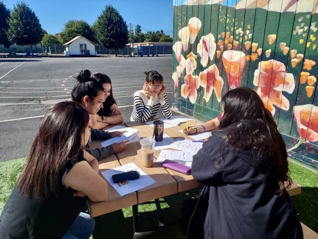 Educators working together at a table