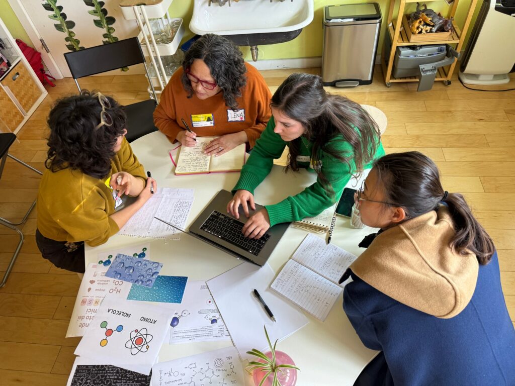 Educators discussing around a table